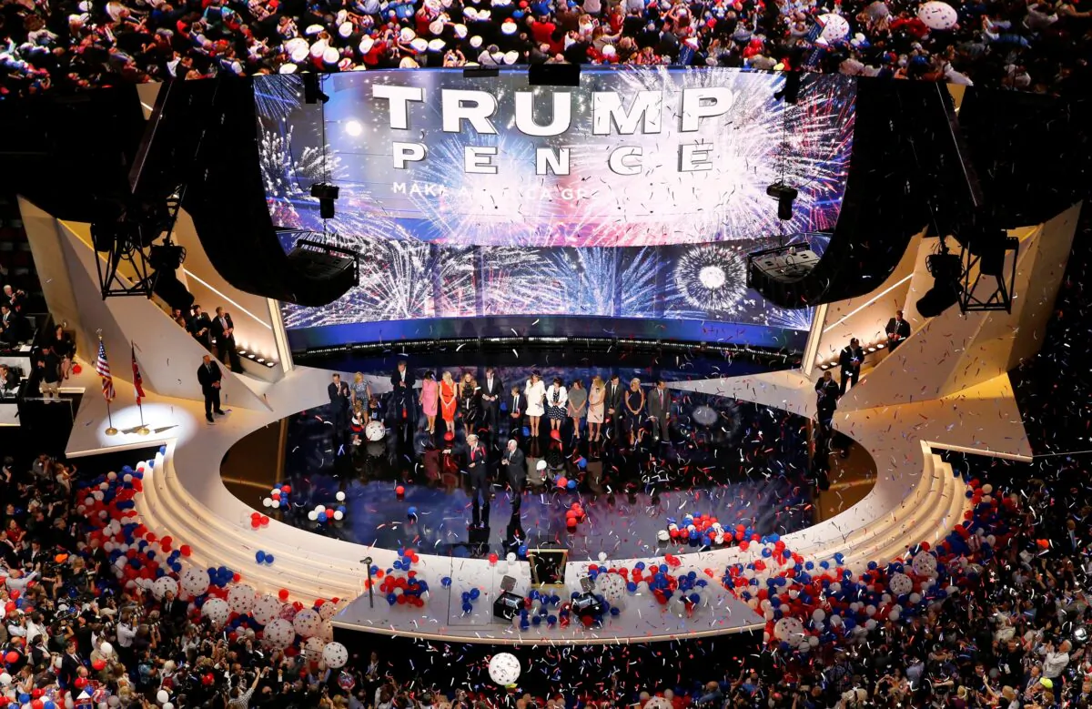 Republican presidential nominee Donald Trump and his family are joined by vice presidential nominee Indiana Gov. Mike Pence and his family on stage at the Republican National Convention in Cleveland, Ohio, on July 21, 2016. (Rick Wilking/Reuters)