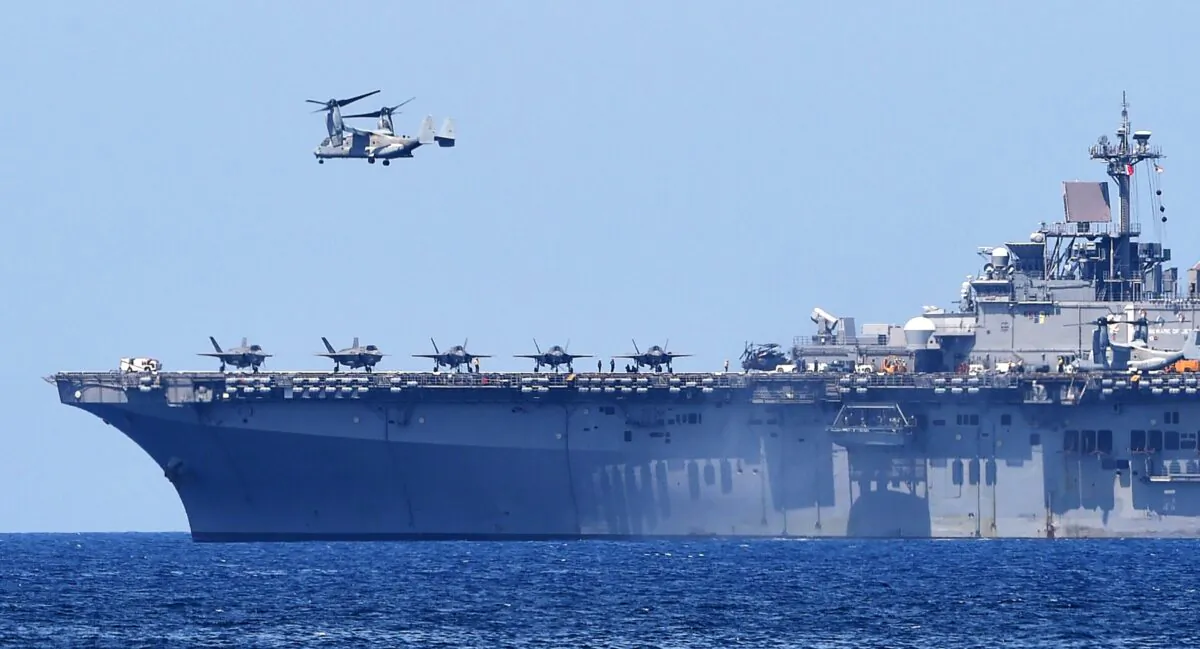 A V-22 Osprey takes off from the USS Wasp as part of the annual joint U.S.-Philippines military exercise on the shores of San Antonio, facing the South China Sea, in Zambales province, Philippines, on April 11, 2019. (Ted Aljibe/AFP via Getty Images)
