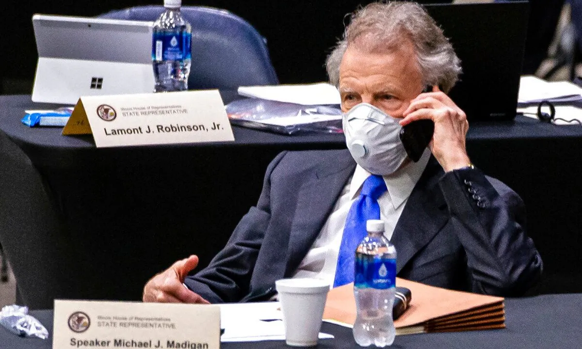 Illinois Speaker of the House Michael Madigan, D-Chicago, talks on his cellphone from his desk during an extended session of the Illinois House of Representatives at the Bank of Springfield Center, in Springfield, Ill., on May 23, 2020. (Justin L. Fowler/The State Journal-Register via AP)