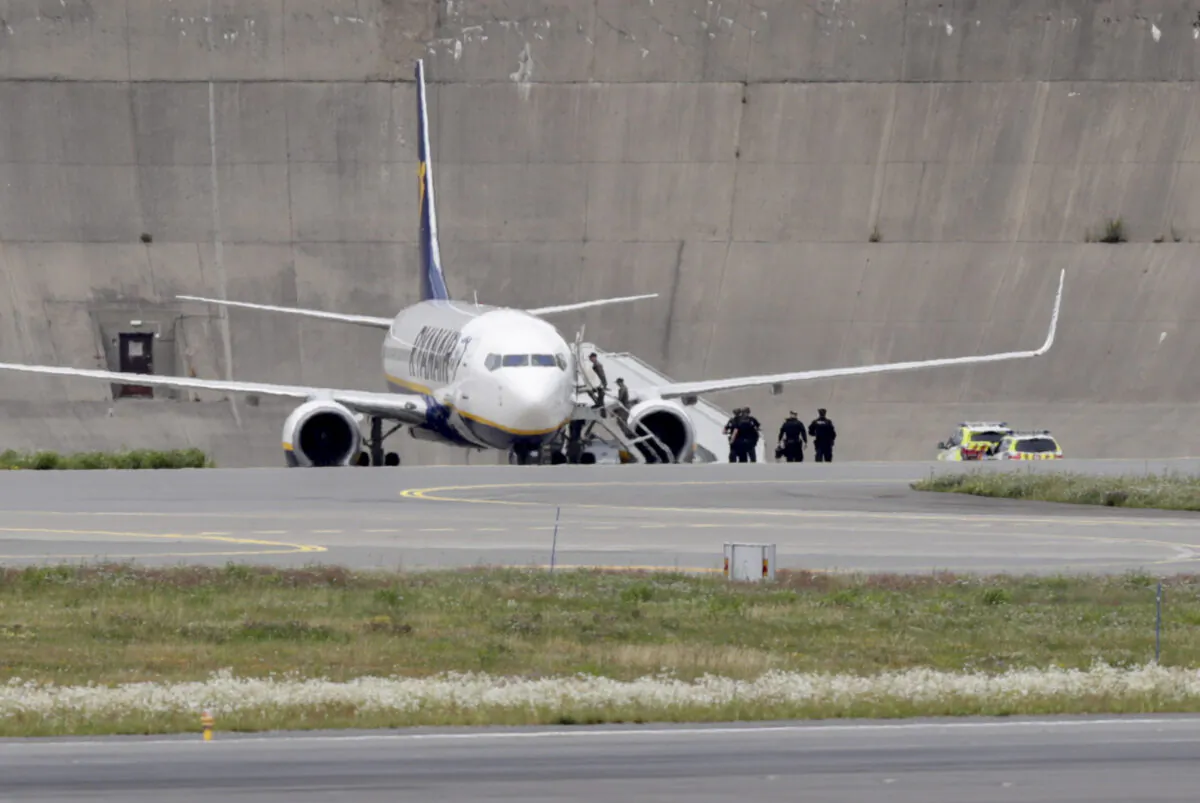 A picture taken on July 17, 2020, shows an aircraft of Irish low-cost carrier Ryanair on the tarmac of the Gardemoen airport about 50 km (30 miles) northeast of the Norwegian capital, where the aircraft landed safely after a bomb threat. (Berit Roald/NTB Scanpix/AFP via Getty Images)