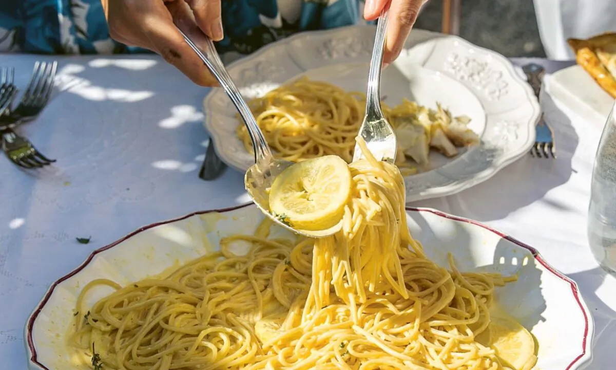 Bright lemons—zested, juiced, and thinly sliced—make this summery pasta like "eating a bowl of sunshine." (Photo by Skye McAlpine)