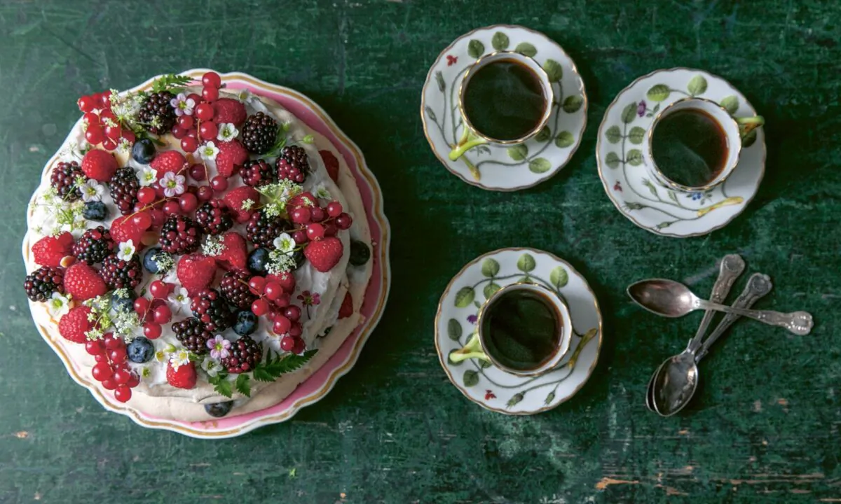 Dreamy layers of meringue, whipped cream, and fresh berries make for a stunning summer dessert, best served with strong espresso or mint tea. (Photo by Skye McAlpine)
