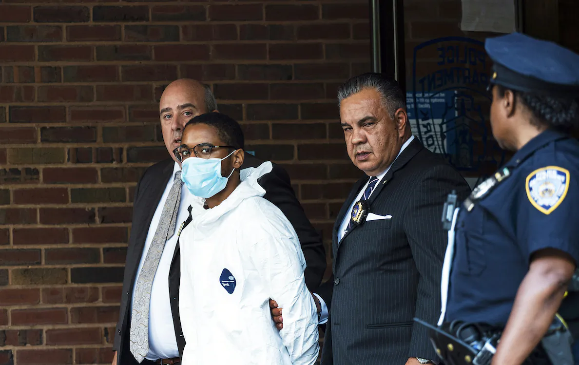Tyrese Devon Haspil, 21, is walked out of NYPD 7th precinct after been charged with second-degree murder in the death of the 33-year-old tech CEO Fahim Saleh, in New York, on July 17, 2020. (AP Photo/Eduardo Munoz Alvarez)