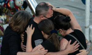 Police Officer Fatally Shot by Patrol Partner in Crossfire, Investigators Say