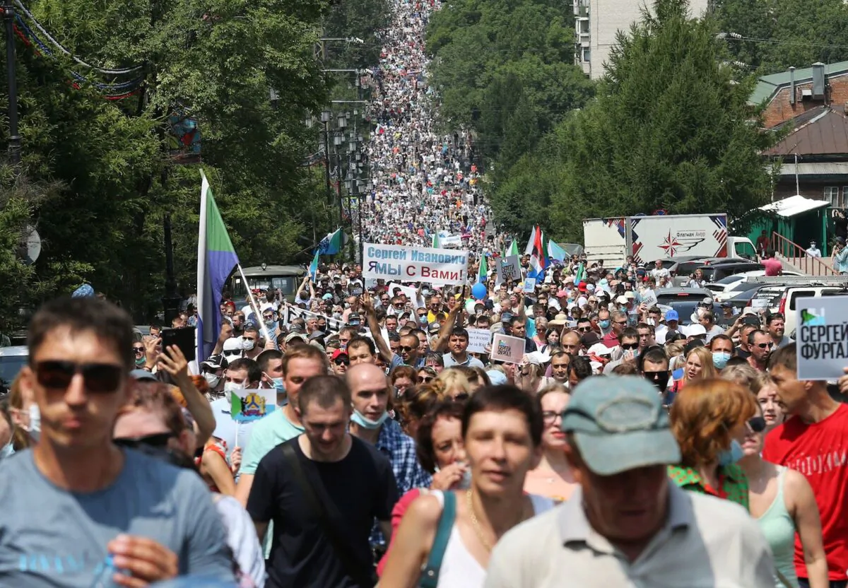 People take part in a rally in support of arrested regional governor Sergei Furgal who is accused of organising the murder of several entrepreneurs 15 years ago, in Khabarovsk, Russia on July 18, 2020. (Evgenii Pereverzev/Reuters)