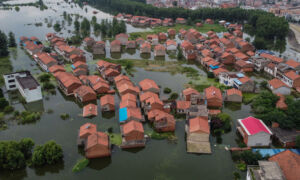 Historic Flooding Wreaks Havoc on Large Swathes of Southern China