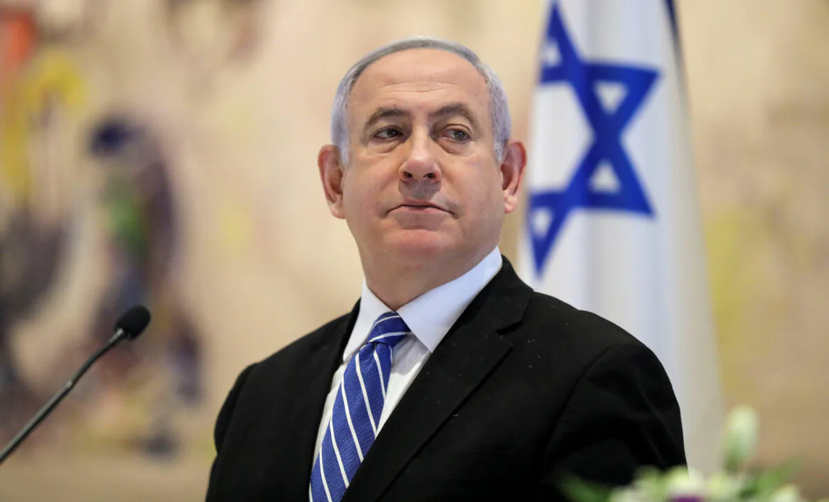 Israeli Prime Minister Benjamin Netanyahu attends the first working cabinet meeting of the new government at the Chagall Hall in the Knesset, the Israeli Parliament in Jerusalem, on May 24, 2020. (Abir Sultan/Pool via Reuters)