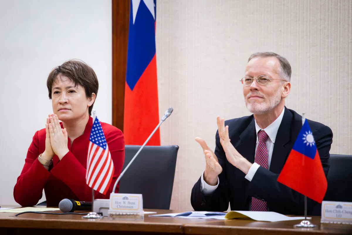 Hsiao Bi-khim (L), Taiwan’s new representative to the U.S., and William Brent Christensen, director of the American Institute in Taiwan, attend an inaugural ceremony in Taipei, Taiwan, on July 20, 2020. (Chen Po-chou/The Epoch Times)