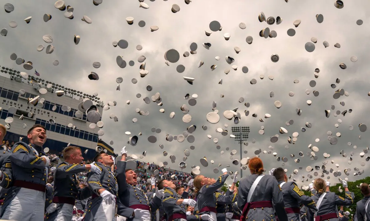 West Point graduates toss their hats in the air at the conclusion of the U.S. Military Academy Class of 2019 graduation ceremony at Michie Stadium, in West Point, N.Y., on May 25, 2019. (David Dee Delgado/Getty Images)