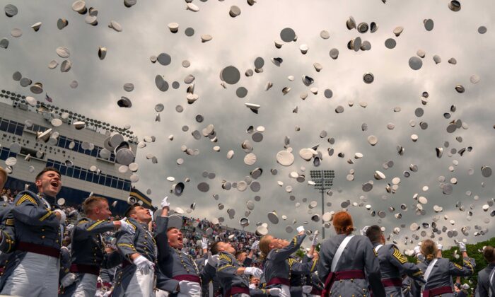 West Point graduates toss their hats in the air at the conclusion of the U.S. Military Academy Class of 2019 graduation ceremony at Michie Stadium, in West Point, N.Y., on May 25, 2019. (David Dee Delgado/Getty Images)