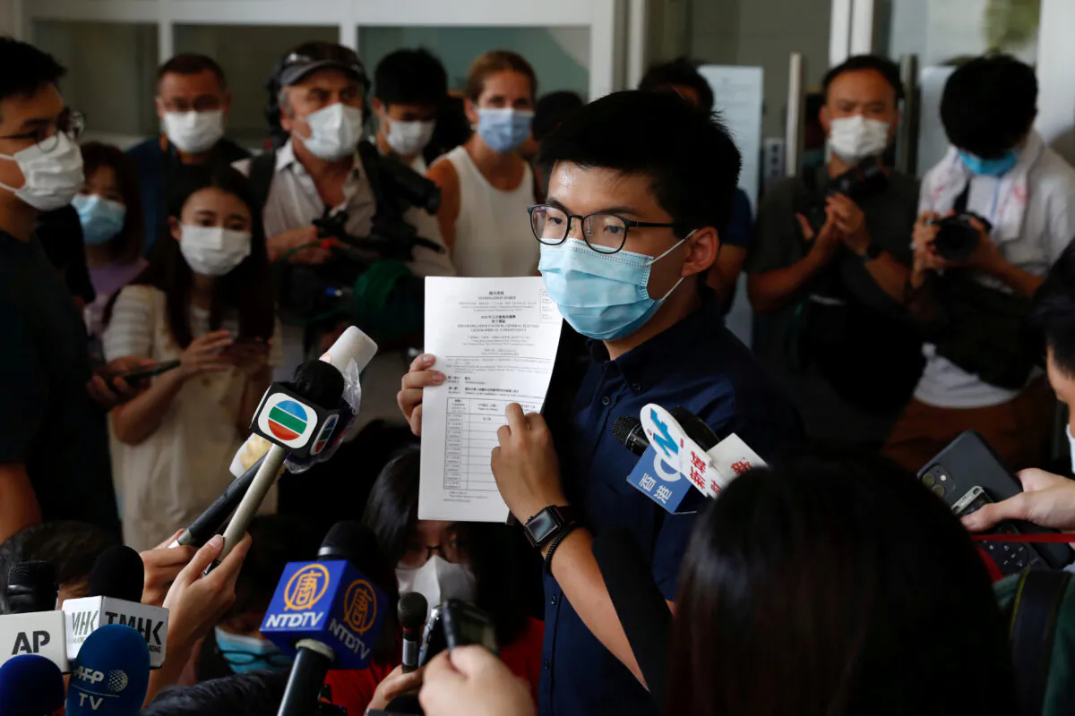 Pro-democracy activist Joshua Wong registers as a candidate for the upcoming Legislative Council election in Hong Kong on July 20, 2020. (Tyrone Siu/Reuters)