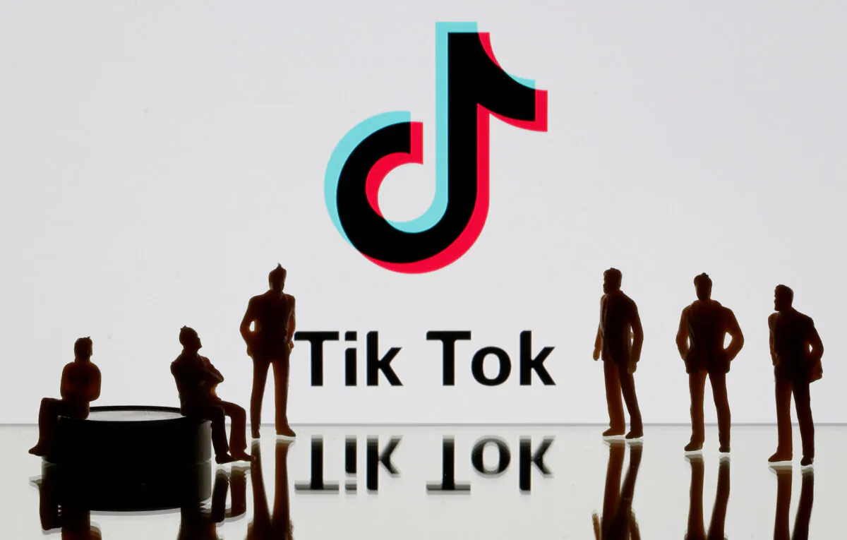 A 3-D printed figures are seen in front of displayed Tik Tok logo in this picture illustration taken Nov. 7, 2019. (REUTERS/Dado Ruvic/Illustration/File Photo)