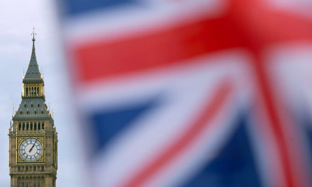 A British Union flag flies near the Elizabeth Tower, otherwise known as Big Ben, opposite the Houses of Parliament in central London, England, on Dec. 7, 2016. (Daniel Leal-Olivas/AFP via Getty Images)