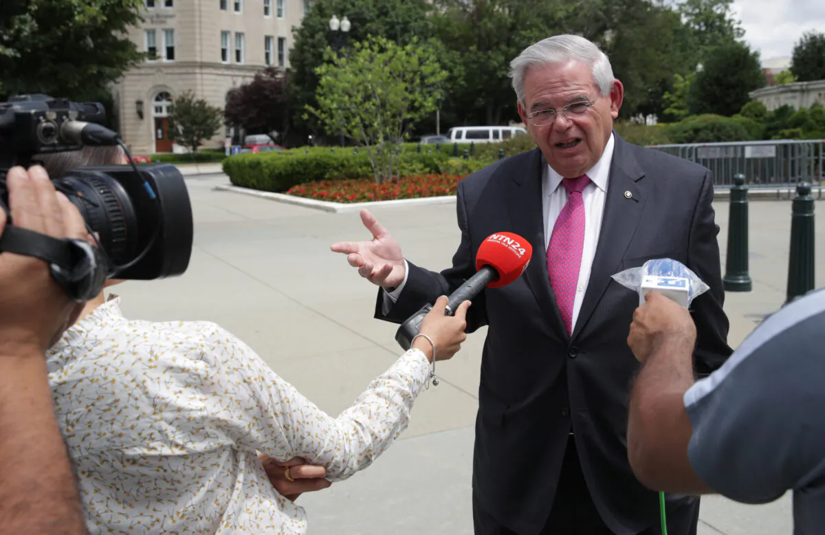 Sen. Bob Menendez (D-N.J.) talks to reporters outside the U.S. Supreme Court in Washington on June 18, 2020. (Jonathan Ernst/File/Reuters)