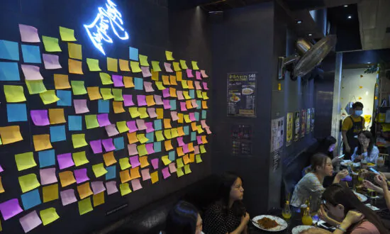 Hong Kong Protesters Adapt Signs, Slogans to Skirt New Law