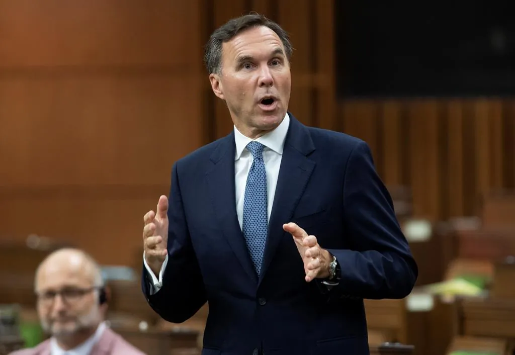 Finance Minister Bill Morneau rises during Question Period in the House of Commons in Ottawa on July 20, 2020. Morneau will appear today before a House of Commons committee that is probing a cancelled agreement for WE Charity to run a student-volunteer program.(Adrian Wyld/The Canadian Press)