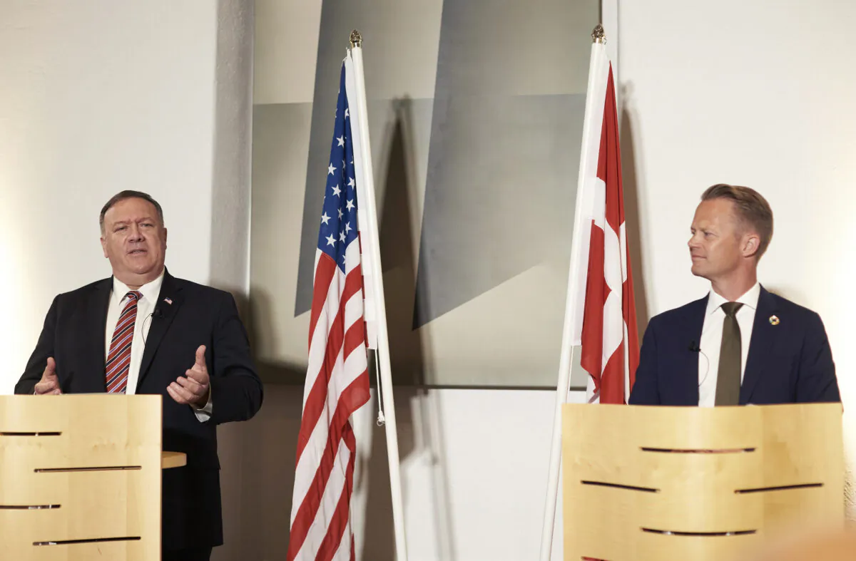 Danish Foreign Minister Jeppe Kofod, right and U.S. Secretary of State Mike Pompeo give a joint press conference in Copenhagen, Denmark, Wed., July 22, 2020.  (Thibault Savary/Pool Photo via AP)