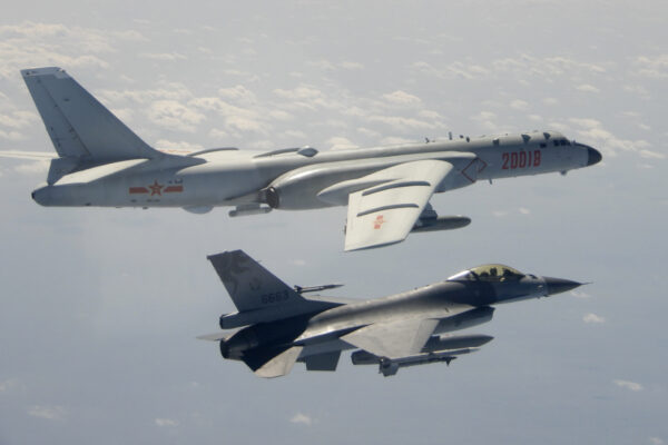 Taiwanese Air Force F-16 in foreground flies on the flank of a Chinese People’s Liberation Army Air Force (PLAAF) H-6 bomber as it passes near Taiwan on Feb. 10, 2020. (Republic of China (ROC) Ministry of National Defense via AP)