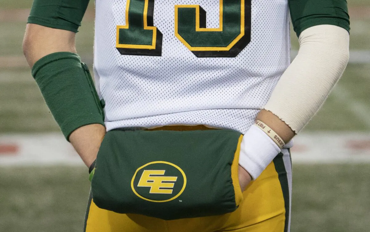 Eskimos quarterback Logan Kilgore (15) looks on from the sidelines late in the second half CFL football game action against the Hamilton Tiger Cats, in Hamilton, Ont. on Oct. 4, 2019. Canadian Football Hall of Famer Hank Ilesic said he "absolutely" will continue to call himself a former Edmonton Eskimo even though the CFL franchise is retiring the longtime team name. (Peter Power/The Canadian Press)