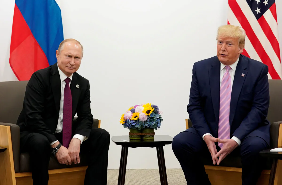 FILE PHOTO: U.S. President Donald Trump meets with Russian President Vladimir Putin at the G20 leaders summit in Osaka, Japan June 28, 2019. (Kevin Lamarque/File PhotoLamarque/File Photo/Reuters)