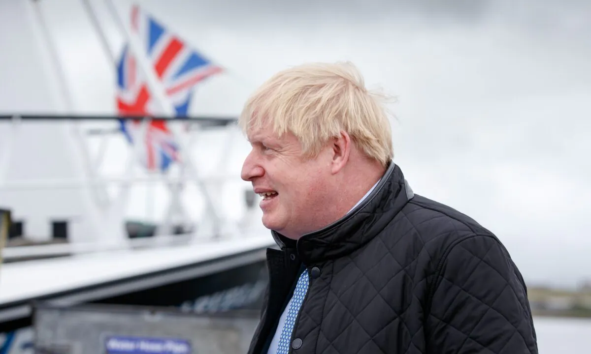 British Prime Minister Boris Johnson during a visit to Stromness Harbour, in Stromness, Scotland, on July 23, 2020. (Robert Perry/Getty Images)