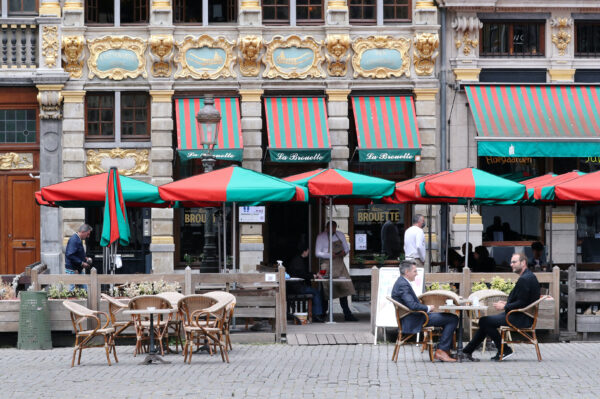 People sit on a terrace as restaurants and bars Brussels