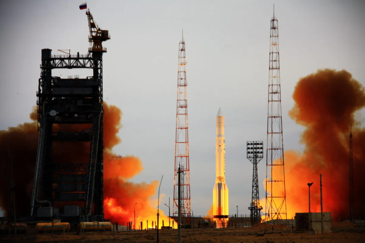 A Russia's Proton rocket, carrying Kosmos military satellite blasts off a launch pad at the Russian leased Kazakhstan's Baikonur cosmodrome, on March 30, 2012. å(STR/AFP via Getty Images)