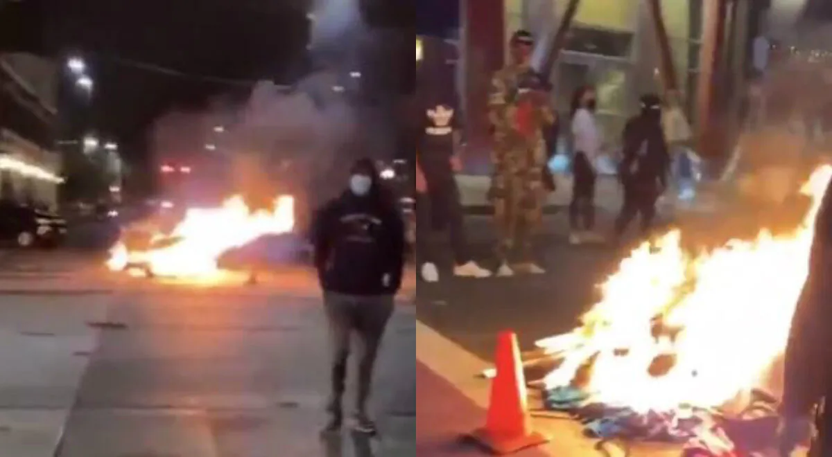 In these still images from video, rioters in Seattle set a fire with items they looted from nearby businesses, early July 23, 2020. (Katie Daviscourt via The Epoch Times)