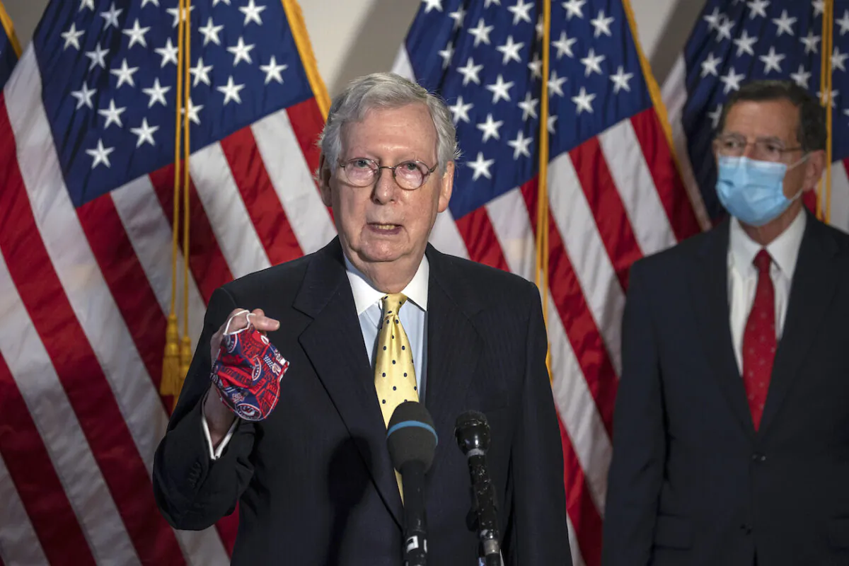 Senate Majority Leader Mitch McConnell (R-Ky.) speaks to the media after weekly policy luncheons on Capitol Hill in Washington on July 21, 2020. (Tasos Katopodis/Getty Images)