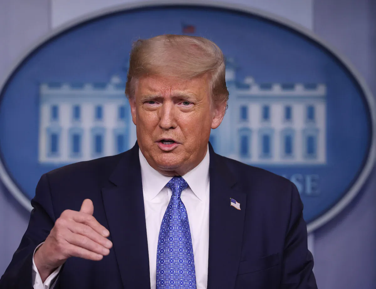 President Donald Trump talks to journalists during a news conference about his administration's response to the ongoing global CCP virus pandemic in the Brady Press Briefing Room at the White House in Washington, on July 22, 2020. (Chip Somodevilla/Getty Images)