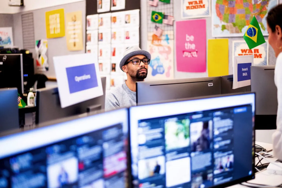 Researcher Andre Souza works in Facebook's "War Room," which is focused on misinformation, during a media demonstration in Menlo Park, Calif., on October 17, 2018. (Noah Berger/AFP via Getty Images)
