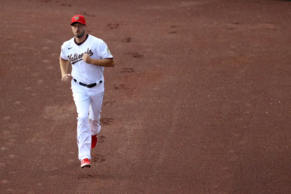 Starting pitcher Max Scherzer of the Washington Nationals warms up before the start of the Opening Day game against the New York Yankees at Nationals Park, in Washington, on July 23, 2020. (Rob Carr/Getty Images)