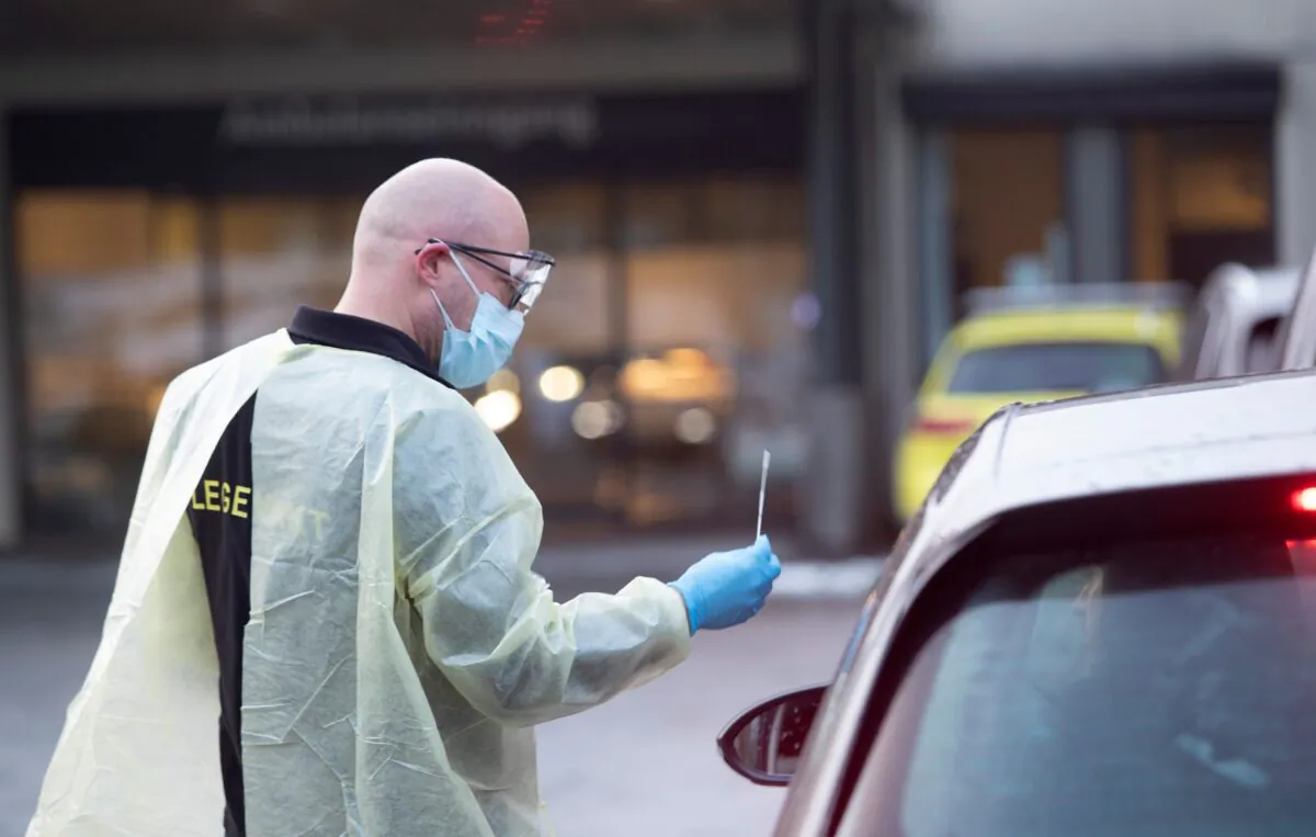 Chief doctor Germra Schneider tests a person for the novel coronavirus in a car outside the emergency unit in Sandvika, Norway, on March 2, 2020. (Terje Bendiksby / NTB Scanpix / AFP via Getty Images).