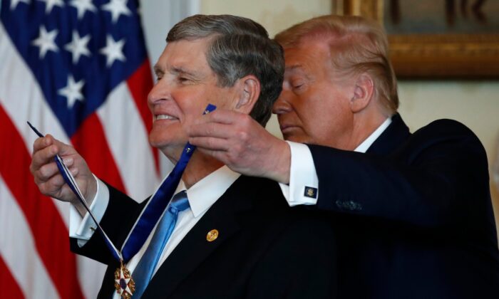President Donald Trump presents the Presidential Medal of Freedom to Jim Ryun, in the Blue Room of the White House in Washington, on July 24, 2020. (Alex Brandon/AP)