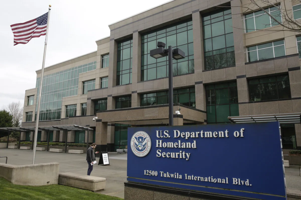 A man stands outside the Department of Homeland Security (DHS) building in Tukwila, Wash., on March 3, 2020. (Jason Redmond/AFP/Getty Images)
