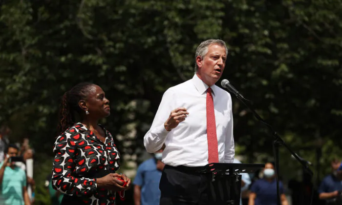 New York Mayor Bill de Blasio speaks to an estimated 10,000 people as they gather in Brooklyn’s Cadman Plaza Park for a memorial service for George Floyd, in New York City on June 4. (Spencer Platt/Getty Images)