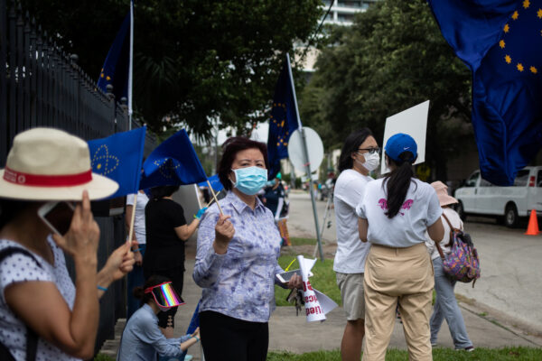 Activists against the Chinese Communist Party protest outside of China's Consulate in Houston, Texas