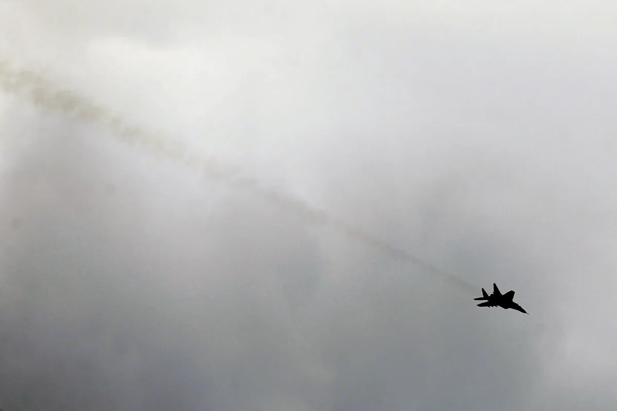A Serbian army MiG-29 jet fighter performs during exercise at a ceremony marking 72 years since the end of WWII and the defeat of Nazi Germany, at Nikinci training ground, 60 kilometers west of Belgrade, Serbia, on May 9, 2017. (Darko Vojinovic/AP Photo)