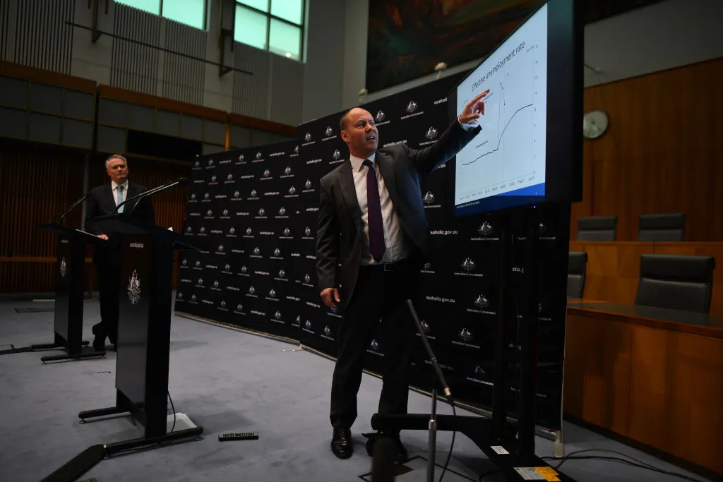 Federal Treasurer Josh Frydenberg and Minister for Finance Mathias Cormann (left) during a press conference in the Main Committee Room at Parliament House in Canberra, Australia on July 23, 2020. (Sam Mooy/Getty Images)