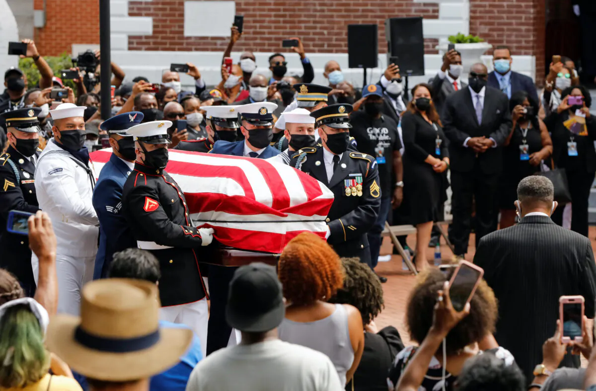 The casket of late U.S. Congressman John Lewis, a pioneer of the civil rights movement and long-time member of the U.S. House of Representatives who died July 17, is carried outside the Brown Chapel A.M.E. Church in Selma, Ala., July 26, 2020. Chris (Aluka Berry/Reuters)
