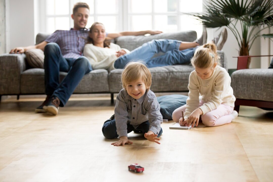 Children are at home on the floor, but as we age, our desire for comfort takes hold and we seek more cushy settings. (fizkes/Shutterstock)