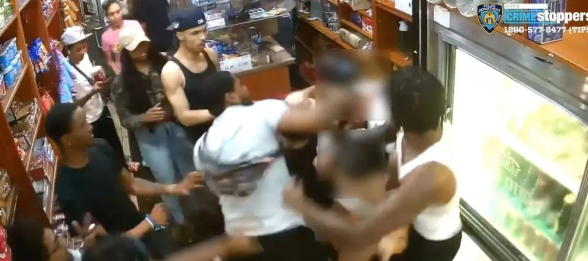 A father and daughter were brutally attacked by a mob inside of a Manhattan deli July 7, a video posted Sunday by the NYPD showed. (NYPD)