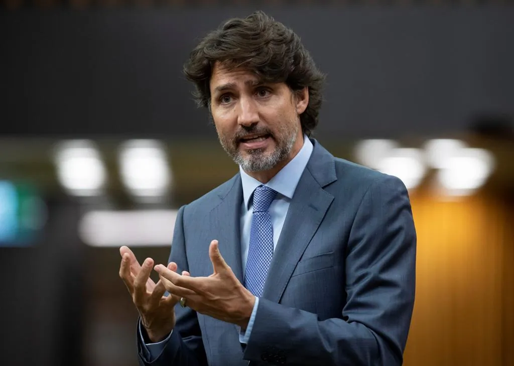 Prime Minister Justin Trudeau rises during a sitting of the Special Committee on the COVID-19 Pandemic in the House of Commons in Ottawa on July 22, 2020. (Adrian Wyld/The Canadian Press)