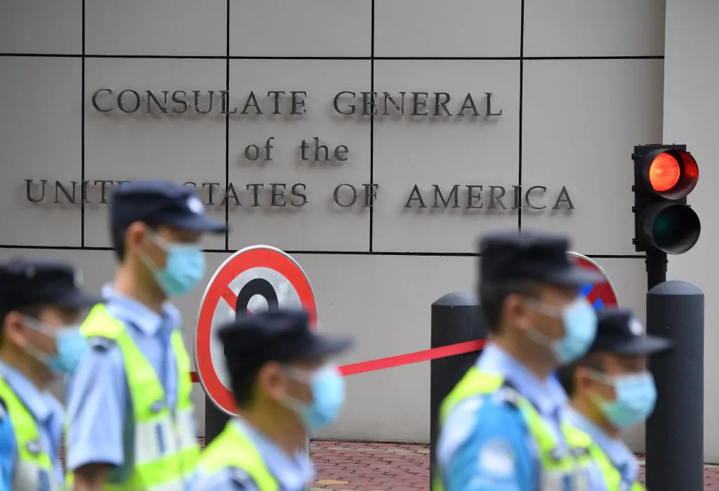 Policemen walk past the US consulate in Chengdu, southwestern China's Sichuan Province, on July 26, 2020. (Noel Celis/AFP via Getty Images)