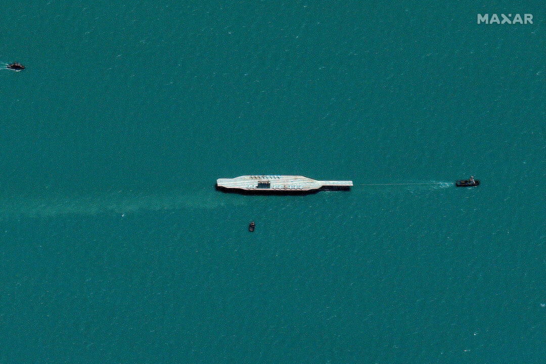 Iran Moves Mock-Up US Carrier to Mouth of Gulf: Satellite Images