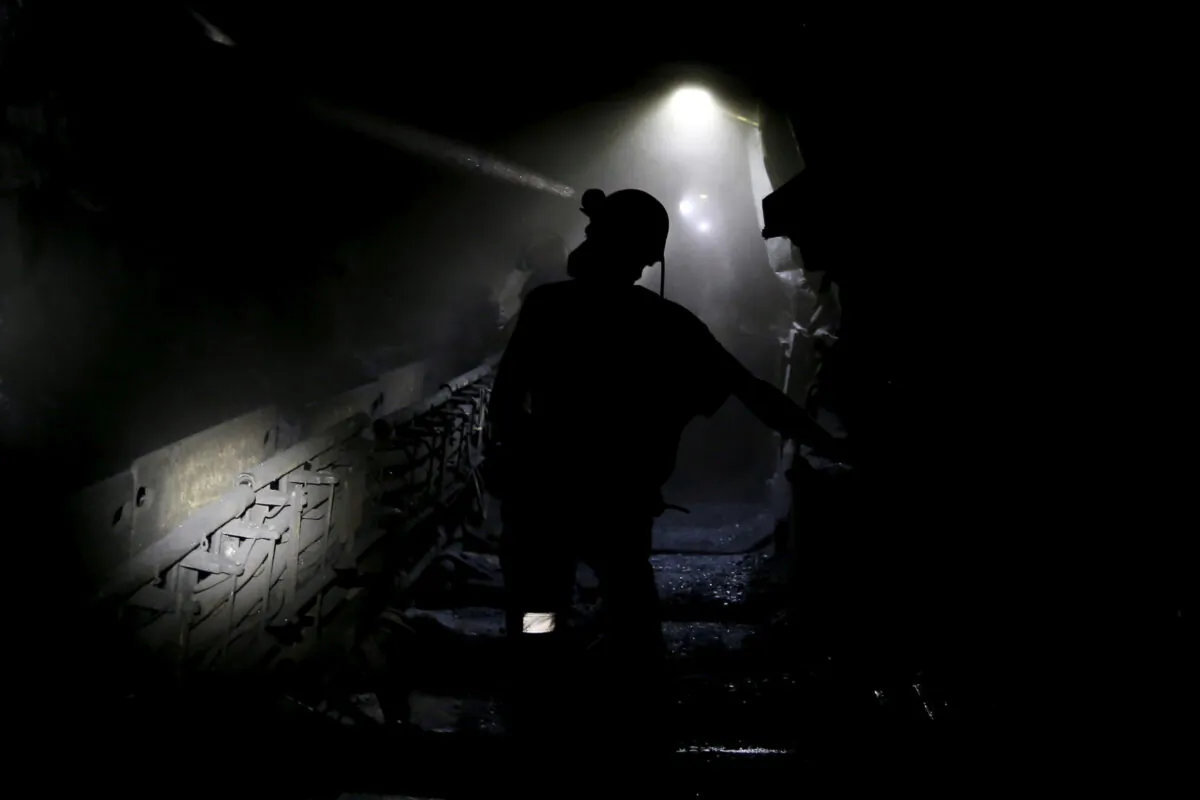 Miners work underground at a coal mine in Silesia, southern Poland, on Sep. 11, 2015. (Kacper Pempel/Reuters)