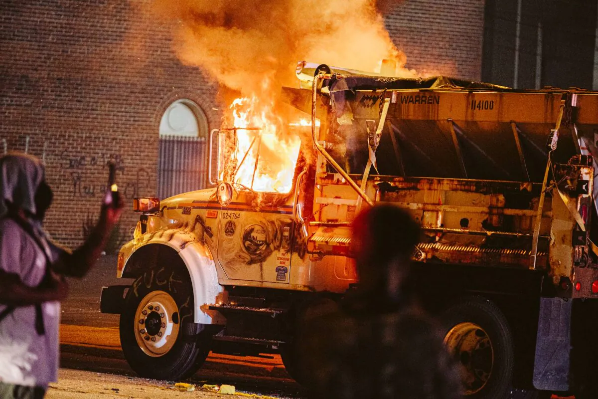 A parked truck is set on fire in Richmond, Va., on on July 25, 2020. (Eze Amos/Getty Images)