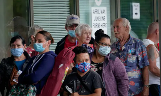 Bipartisan Group of Lawmakers Propose $900 Billion Pandemic ‘Bridge’ Aid Package