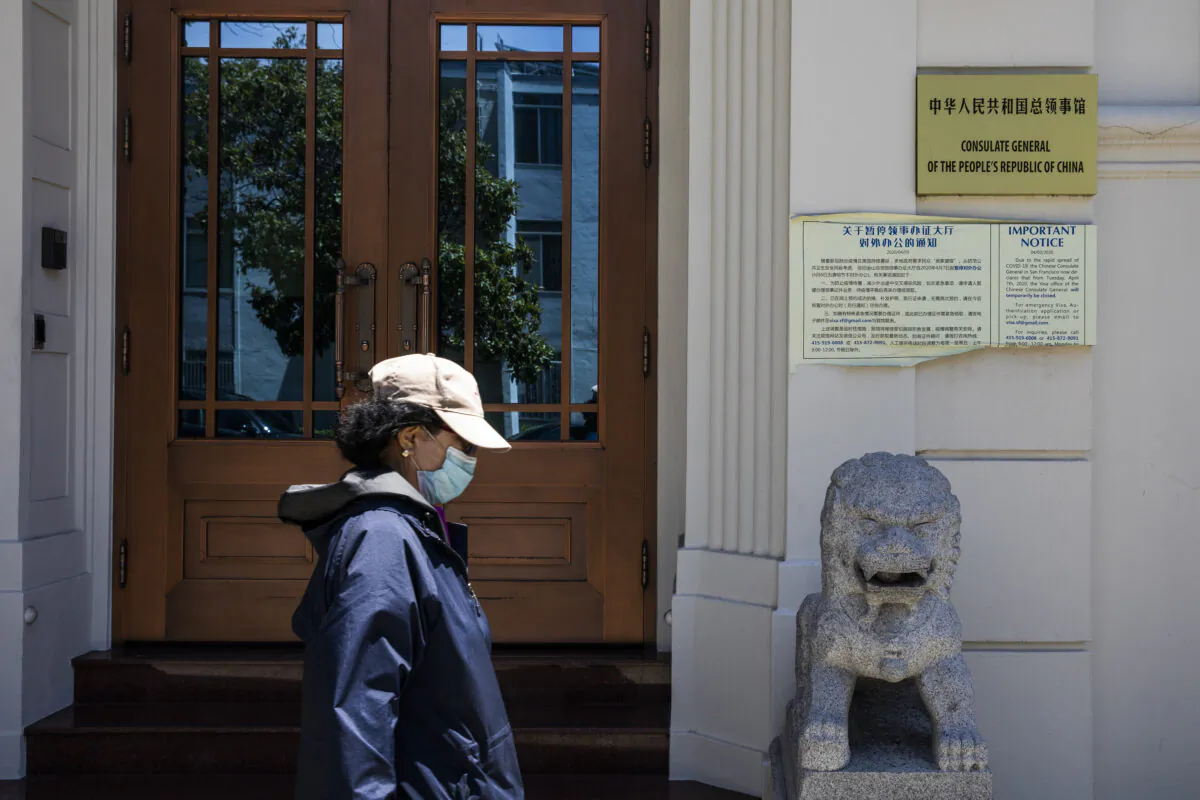 A person walks past the Consulate General of the People's Republic of China in San Francisco on July 23, 2020.  (PHILIP PACHECO/AFP via Getty Images)