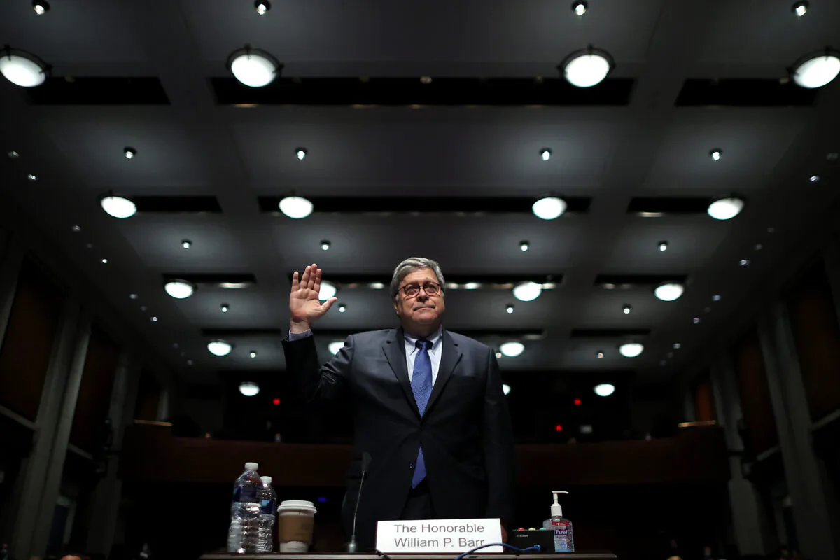 Attorney General William Barr takes the oath before he testifies before the House Judiciary Committee hearing in the Congressional Auditorium at the US Capitol Visitors Center July 28, 2020, in Washington. (Chip Somodevilla/AFP via Getty Images)
